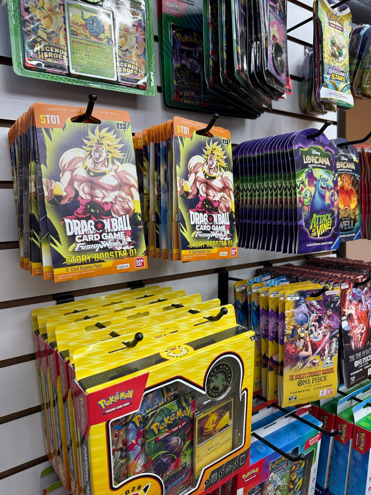 Pokémon and Dragon Ball product wall at Deadweight TCG
